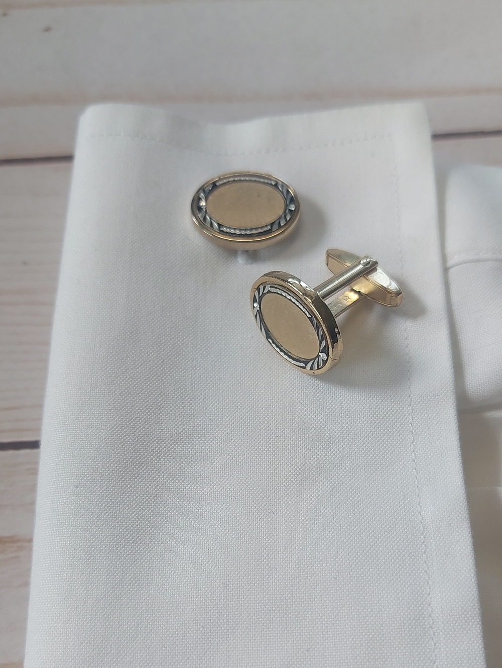Gold-Tone Oval Cufflinks with Black Accent Border - Men's Accessories